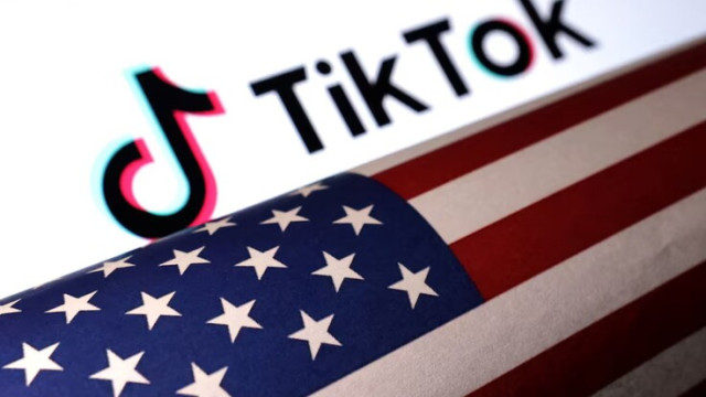 U.S. flag is placed on a TikTok logo in this illustration taken March 20, 2024